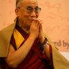 His Holiness the Dalai Lama with palms together.