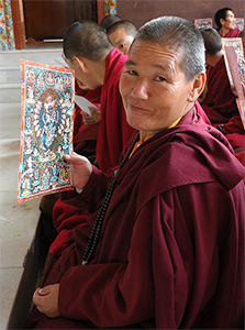 Tibetan nun smiling.