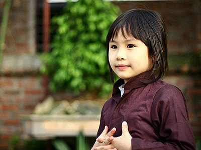 Mỉm cười con.