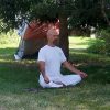 Tom meditating outside at the Abbey.