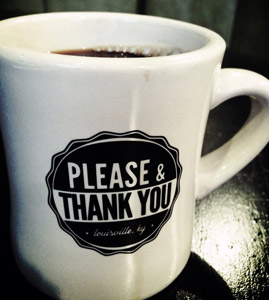 A cup with the words: Please & Thank You.