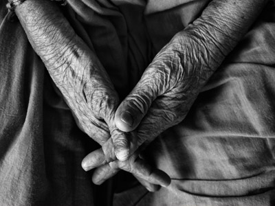 A pair of wrinkled old hands.