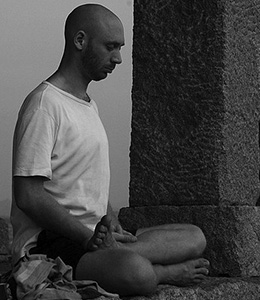 Man sitting in meditation.