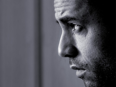 Black and white closeup of a man's face.