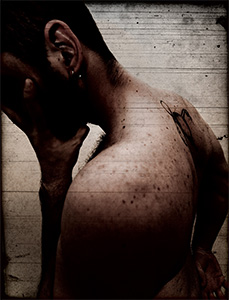 Man with his head held in his hand.
