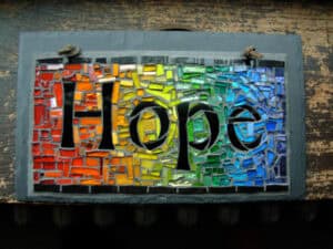 A Hope Rainbow Mosaic sign.
