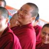 Tibetan nuns smiling.