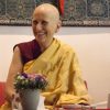 Venerable smiling while teaching.