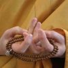 Mandala offering hand mudra.