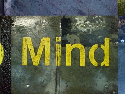 The word "Mind" painted on a wall.
