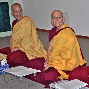 Venerables Chodron, Semkye and Jigme sitting together.