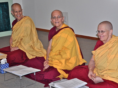 Venerables Chodron, Semkye and Jigme sitting together.