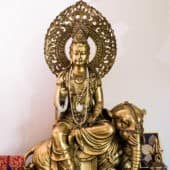 Bronze statue of Kuan Yin appearing as Samantabhadra on an elephant.