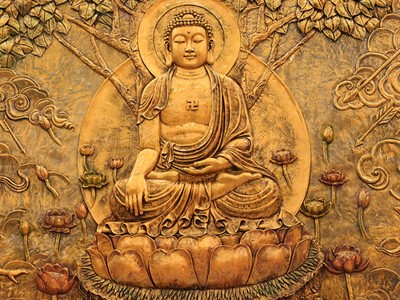 A copper-plate picture of a sitting Buddha.