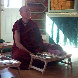 Ven. Chogkyi listening to Ven. Chodron give a Dharma talk.