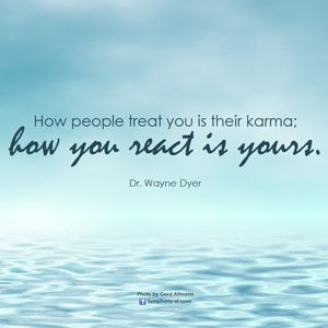 A blue background with the words How people treat you is their karma; how you react is yours.