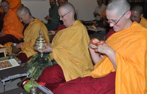 Picture of Venerable Chonyi, Jigme and Chodron smiling happily