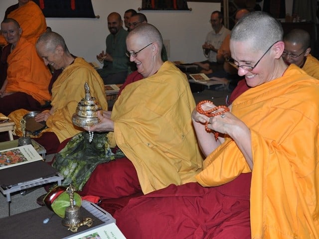 Picture of Venerable Chonyi, Jigme and Chodron smiling happily