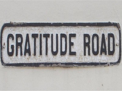 A road sign with the name Gratitude Road.