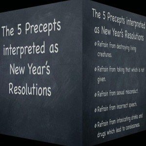 A card with the words written: The 5 precepts interpreted as New Year's Resolutions