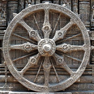 Stone carving of Wheel of Dharma.