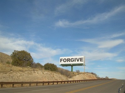 Highway sign that says "Forgive".