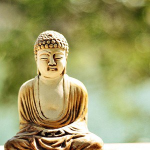 A small stone statute of Buddha