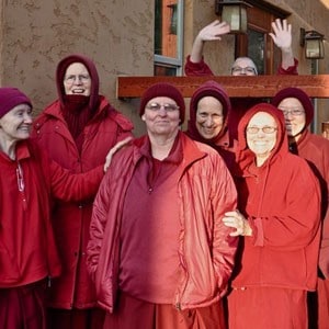 Group of smiling Abbey monastics.