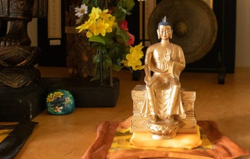 Golden statue of Maitreya bodhisattva.