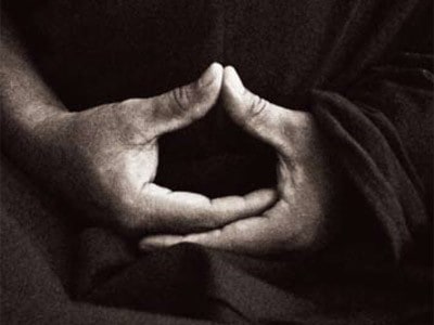 Hand in meditation position.