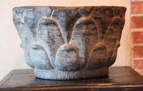 Jewish stone ablution bowl in lotus leaves