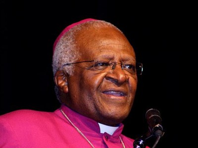 Archbishop Desmond Tutu giving a speech.
