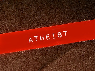 The word 'atheist' on a red label.