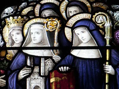 Stained glass image of Benedictine nuns.