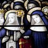Stained glass image of Benedictine nuns.