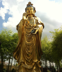 A very tall statute of Kwan Yin in Singapore.
