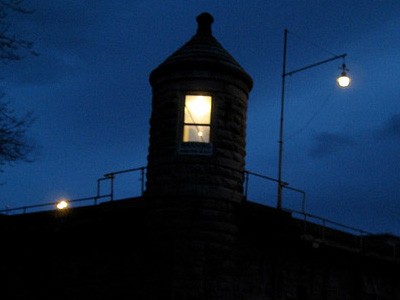 Silhouette of guard station atop Oregon State Penitentiary.