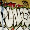 The word: Punish written on a wall.
