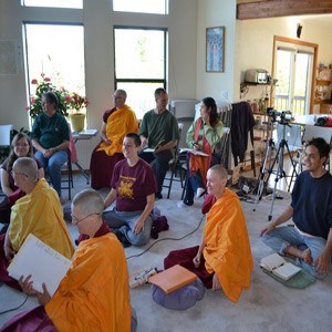 Abbey sangha with young adults waiting for Dharma teaching by Venerable Chodron