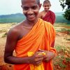 Two smiling Sri Lankan monks.