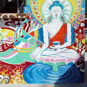 Colorful mural on Vajrasattva on a building in Mexico.