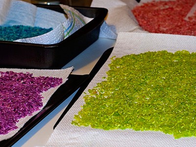 Rice in different colors on a table.
