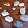 Cute little rocks with words: serenity, smile, energy, harmonie, generosity, humour.