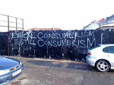 A wall with the word Ethical consumerism is still consumerism.