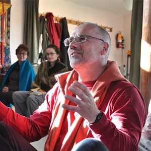 Abbey retreatant in discussion during a Dharma talk.
