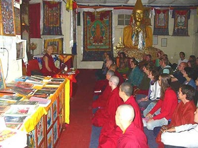 Sangha and lay practitioners listening carefully as Venerable Chodron teaches.