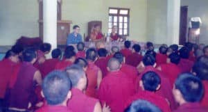 Venerable speaking to a large group of monastics.