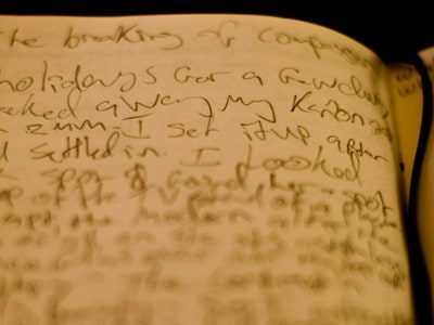 Closeup of handwriting on a page in a journal.