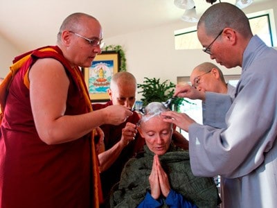 The bhikshuni elders shaving Venerable Samten head.