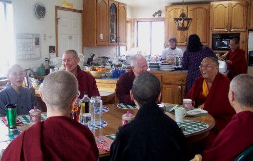 Venerable Chogkyi walking with the sangha.